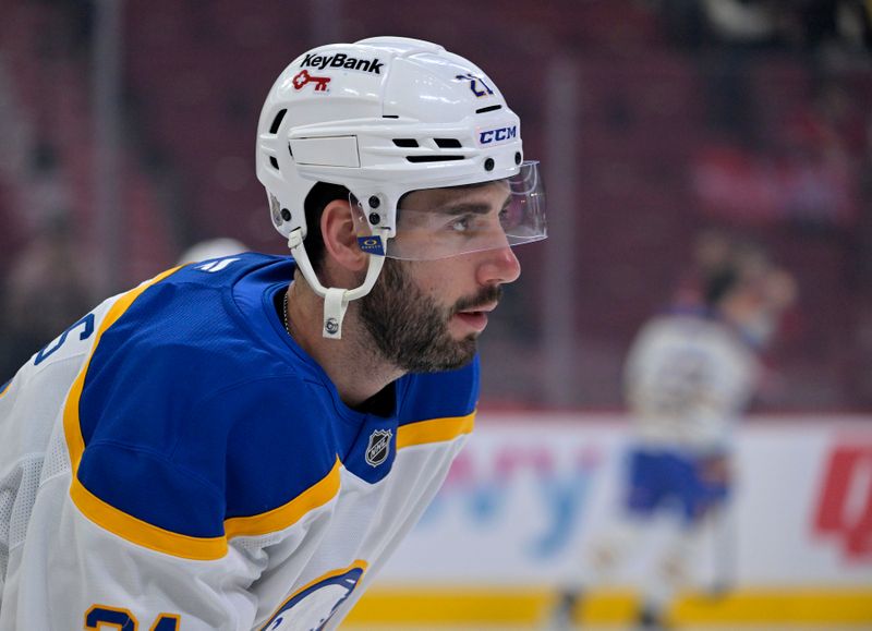 Oct 20, 2025; Montreal, Quebec, CAN; Buffalo Sabres defenseman Conor Timmins (21) skates during the warmup period before the game against the Montreal Canadiens at the Bell Centre. Mandatory Credit: Eric Bolte-Imagn Images