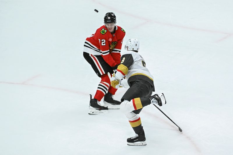 Jan 18, 2025; Chicago, Illinois, USA;  Vegas Golden Knights center Jack Eichel (9) passes the puck past Chicago Blackhawks defenseman Alex Vlasic (72) during the second period at United Center. Mandatory Credit: Matt Marton-Imagn Images