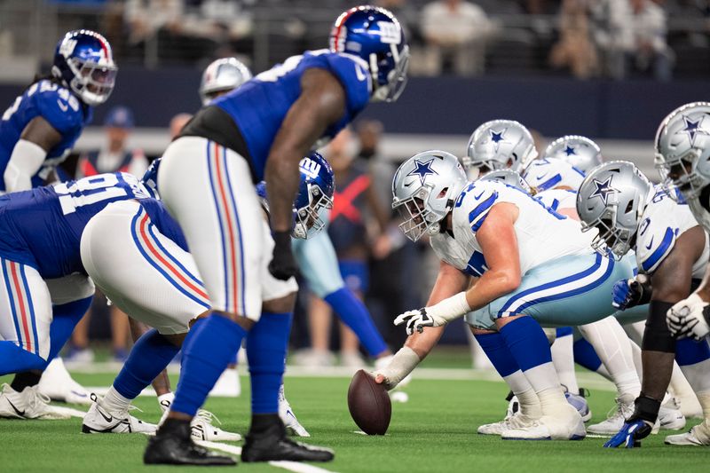 Dallas Cowboys center Brock Hoffman prepares to snap the ball during the second half of an NFL football game between the Dallas Cowboys and the New York Giants, Sunday, Nov. 12, 2023, in Arlington, Texas. The Cowboys won 49-17. (AP Photo/Julio Cortez)