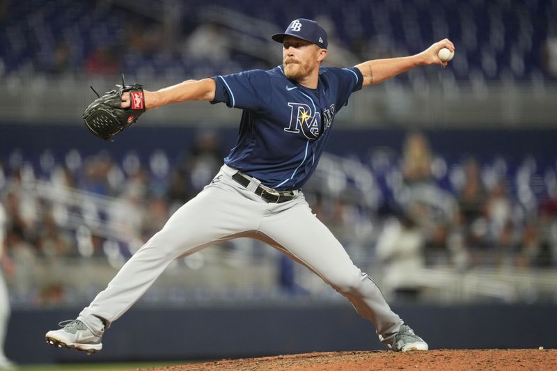 Aug 29, 2023; Miami, Florida, USA;  Tampa Bay Rays relief pitcher Jake Diekman (30) pitches against the Miami Marlins in the ninth inning at loanDepot Park. Mandatory Credit: Jim Rassol-USA TODAY Sports