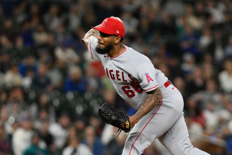 Sep 11, 2023; Seattle, Washington, USA; Los Angeles Angels relief pitcher Jose Marte (68) pitches to the Seattle Mariners during the tenth inning at T-Mobile Park. Mandatory Credit: Steven Bisig-USA TODAY Sports