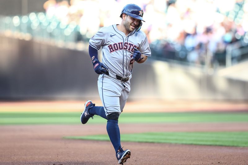 Jun 28, 2024; New York City, New York, USA;  Houston Astros second baseman Jose Altuve (27) rounds the bases after hitting a leadoff home run in the first inning against the New York Mets at Citi Field. Mandatory Credit: Wendell Cruz-USA TODAY Sports