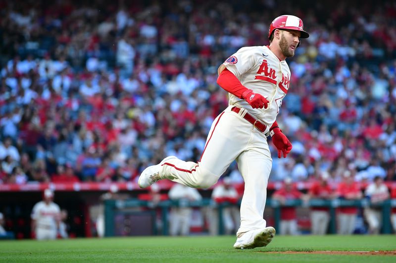 Jul 1, 2023; Anaheim, California, USA; Los Angeles Angels left fielder Taylor Ward (3) runs after hitting a double against the Arizona Diamondbacks during the second inning at Angel Stadium. Mandatory Credit: Gary A. Vasquez-USA TODAY Sports