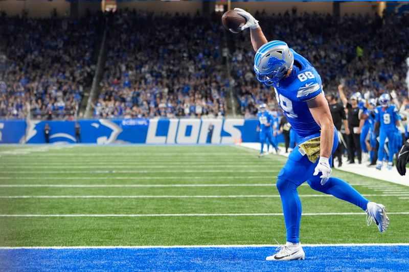 Detroit Lions tight end Brock Wright (89) celebrates his five-yard touchdown reception against the Jacksonville Jaguars during the first half of an NFL football game, Sunday, Nov. 17, 2024, in Detroit. (AP Photo/Carlos Osorio)