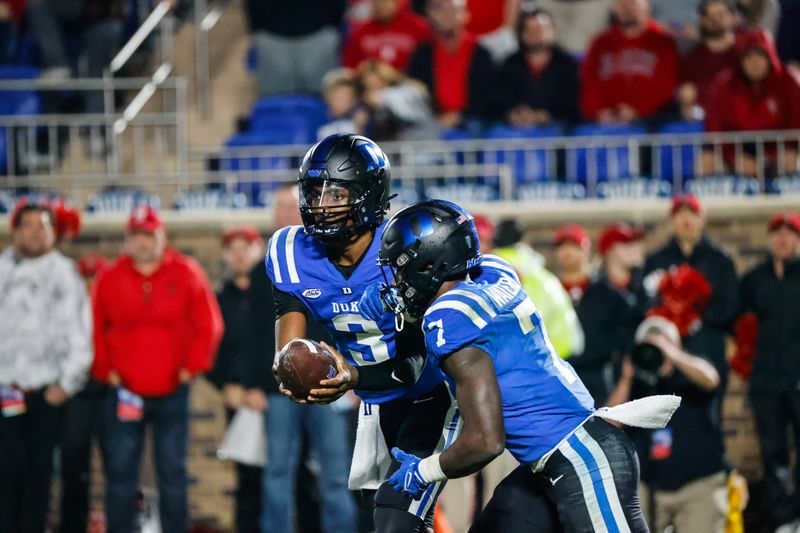 Oct 14, 2023; Durham, North Carolina, USA; Duke Blue Devils quarterback Henry Belin IV (3) passes the ball to running back Jordan Waters (7) during the second half of the game against North Carolina State Wolfpack at Wallace Wade Stadium. Mandatory Credit: Jaylynn Nash-USA TODAY Sports