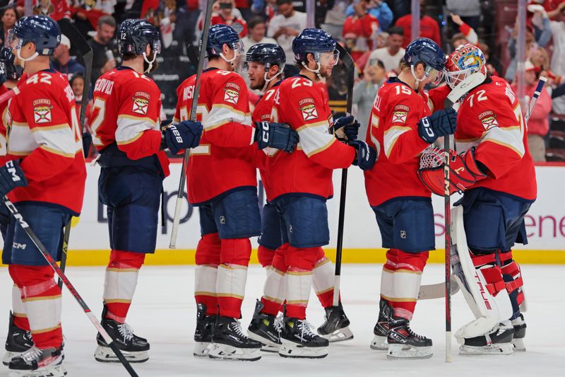 May 24, 2025; Sunrise, Florida, USA; The Florida Panthers celebrate the win against the Carolina Hurricanes in game three of the Eastern Conference Final of the 2025 Stanley Cup Playoffs at Amerant Bank Arena. Mandatory Credit: Sam Navarro-Imagn Images