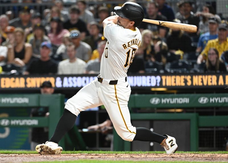 Aug 3, 2024; Pittsburgh, Pennsylvania, USA;  Pittsburgh Pirates batter Bryan Reynolds hits a home run against the Arizona Diamondbacks in the sixth inning at PNC Park. Mandatory Credit: Philip G. Pavely-USA TODAY Sports