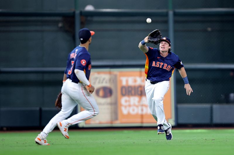 Aug 4, 2024; Houston, Texas, USA; Houston Astros center fielder Jake Meyers (6) catches a fly ball for an out against the Tampa Bay Rays during the ninth inning at Minute Maid Park. Mandatory Credit: Erik Williams-USA TODAY Sports