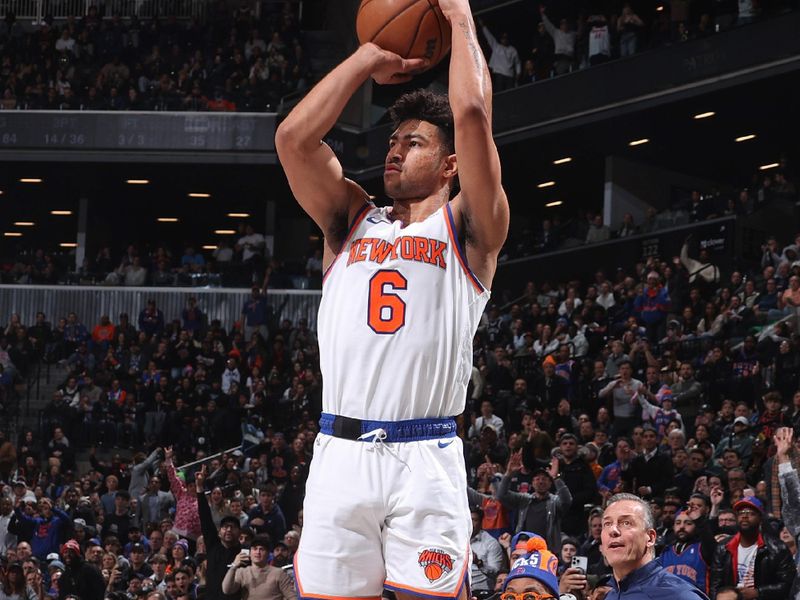 BROOKLYN, NY - JANUARY 23: Quentin Grimes #6 of the New York Knicks three point basket during the game against the Brooklyn Nets on January 23, 2024 at Barclays Center in Brooklyn, New York. NOTE TO USER: User expressly acknowledges and agrees that, by downloading and or using this Photograph, user is consenting to the terms and conditions of the Getty Images License Agreement. Mandatory Copyright Notice: Copyright 2024 NBAE (Photo by Nathaniel S. Butler/NBAE via Getty Images)