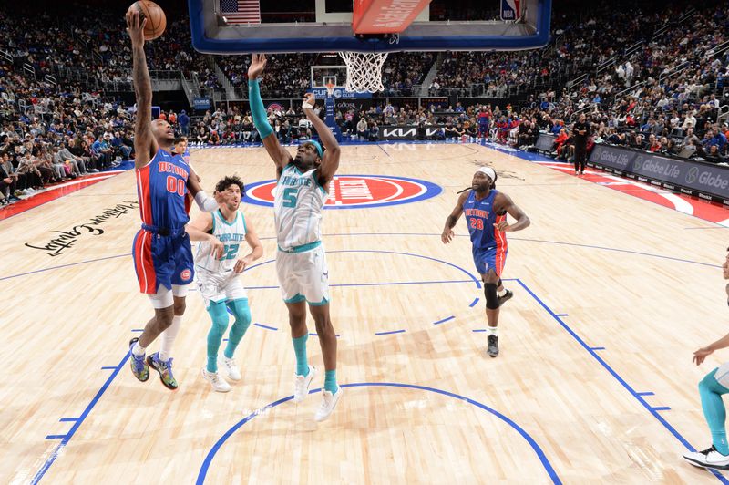 DETROIT, MI - JANUARY 3: Ron Holland II #00 of the Detroit Pistons drives to the basket during the game against the Charlotte Hornets on January 3, 2025 at Little Caesars Arena in Detroit, Michigan. NOTE TO USER: User expressly acknowledges and agrees that, by downloading and/or using this photograph, User is consenting to the terms and conditions of the Getty Images License Agreement. Mandatory Copyright Notice: Copyright 2025 NBAE (Photo by Chris Schwegler/NBAE via Getty Images)