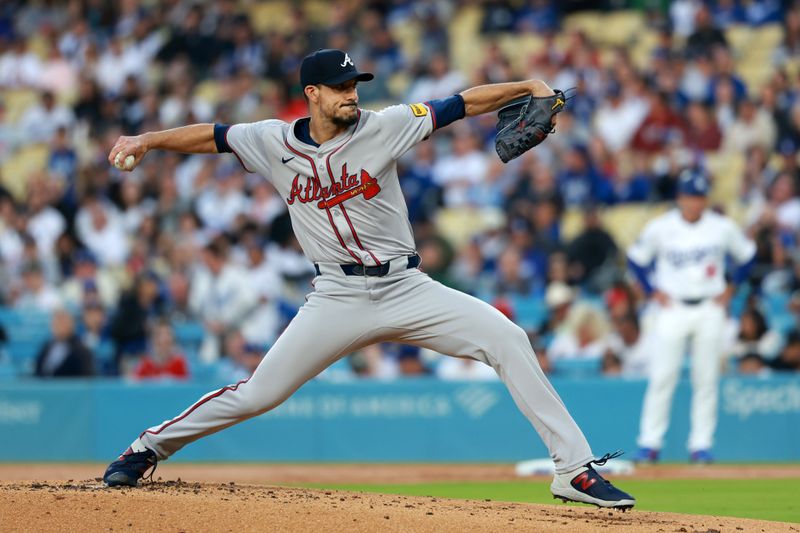 May 3, 2024; Los Angeles, California, USA;  Atlanta Braves pitcher Charlie Morton (50) pitches in the first inning against the Los Angeles Dodgers at Dodger Stadium. Mandatory Credit: Kiyoshi Mio-USA TODAY Sports