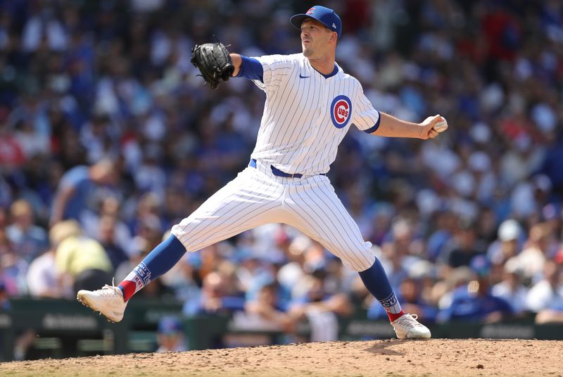 May 31, 2024; Chicago, Illinois, USA; Chicago Cubs pitcher Drew Smyly (11) delivers a pitch during the sixth inning against the Cincinnati Reds at Wrigley Field. Mandatory Credit: Melissa Tamez-USA TODAY Sports