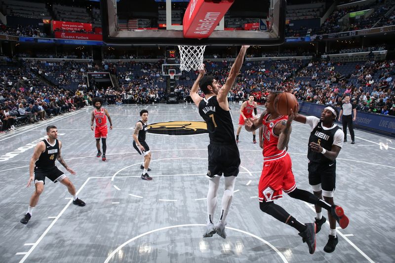 MEMPHIS, TN - FEBRUARY 8: DeMar DeRozan #11 of the Chicago Bulls looks to pass the ball during the game against the Memphis Grizzlies on February 8, 2024 at FedExForum in Memphis, Tennessee. NOTE TO USER: User expressly acknowledges and agrees that, by downloading and or using this photograph, User is consenting to the terms and conditions of the Getty Images License Agreement. Mandatory Copyright Notice: Copyright 2024 NBAE (Photo by Joe Murphy/NBAE via Getty Images)