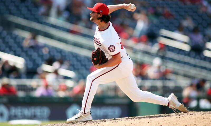 Jun 16, 2024; Washington, District of Columbia, USA; Washington Nationals pitcher Kyle Finnegan (67) throws during the ninth inning in a game against the Miami Marlins at Nationals Park. Mandatory Credit: Daniel Kucin Jr.-USA TODAY Sports