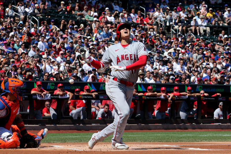 Aug 27, 2023; New York City, New York, USA; Los Angeles Angels designated hitter Shohei Ohtani (17) reacts after fouling a ball off his foot during the first inning against the New York Mets at Citi Field. Mandatory Credit: Brad Penner-USA TODAY Sports