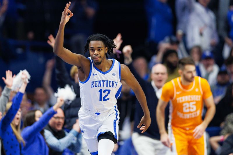 Feb 18, 2023; Lexington, Kentucky, USA; Kentucky Wildcats guard Antonio Reeves (12) celebrates a three point basket during the first half against the Tennessee Volunteers at Rupp Arena at Central Bank Center. Mandatory Credit: Jordan Prather-USA TODAY Sports