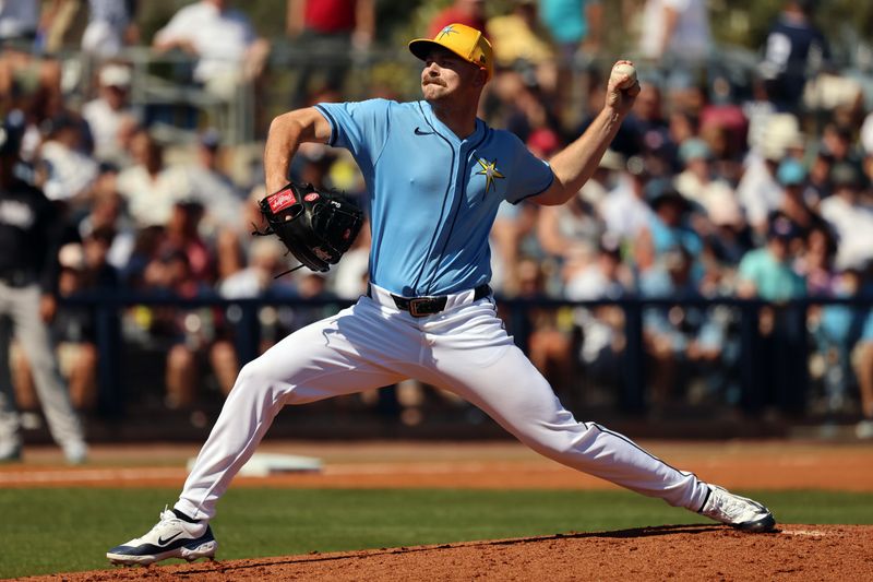 Feb 27, 2024; Port Charlotte, Florida, USA;  Tampa Bay Rays relief pitcher Tyler Alexander (14) throws a pitch during the fourth inning against the New York Yankees at Charlotte Sports Park. Mandatory Credit: Kim Klement Neitzel-USA TODAY Sports