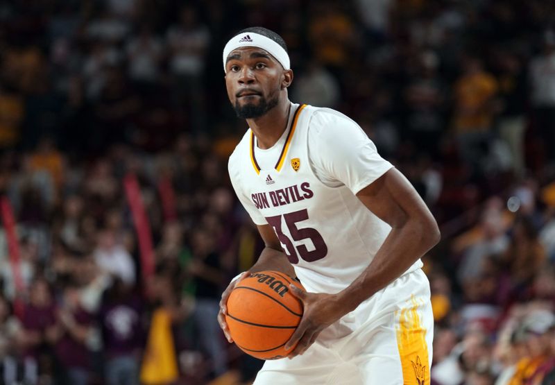 Feb 18, 2023; Tempe, Arizona, USA; Arizona State Sun Devils guard Devan Cambridge (35) controls the ball against the Utah Utes during the second half at Desert Financial Arena. Mandatory Credit: Joe Camporeale-USA TODAY Sports