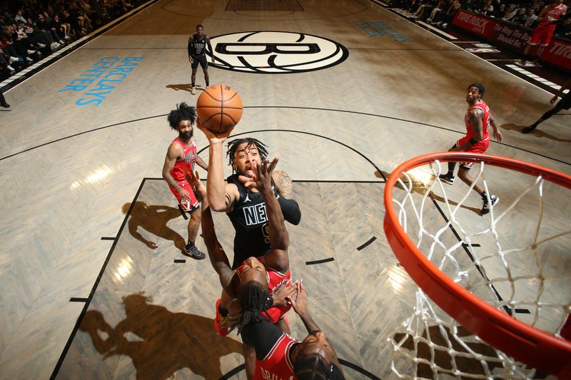 BROOKLYN, NY - MARCH 29: Trendon Watford #9 of the Brooklyn Nets drives to the basket during the game against the Chicago Bulls on March 29, 2024 at Barclays Center in Brooklyn, New York. NOTE TO USER: User expressly acknowledges and agrees that, by downloading and or using this Photograph, user is consenting to the terms and conditions of the Getty Images License Agreement. Mandatory Copyright Notice: Copyright 2024 NBAE (Photo by Nathaniel S. Butler/NBAE via Getty Images)