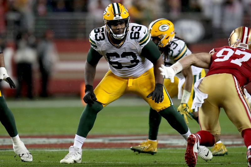 Green Bay Packers offensive tackle Rasheed Walker (63) blocks during an NFL divisional round playoff football game against the San Francisco 49ers Saturday, Jan. 20, 2024, in Santa Clara. (AP Photo/Scot Tucker)