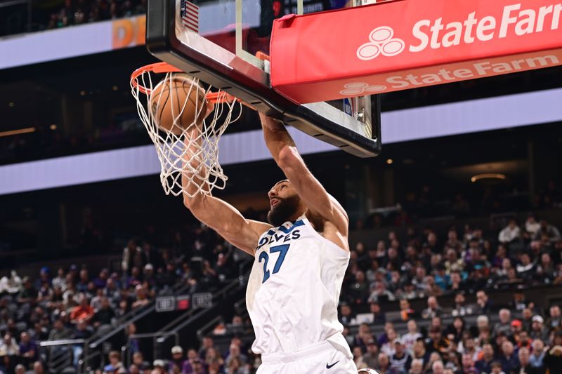 PHOENIX, AZ - JANUARY 29: Rudy Gobert #27 of the Minnesota Timberwolves dunks the ball during the game against the Phoenix Suns on January 29, 2025 at Footprint Center in Phoenix, Arizona. NOTE TO USER: User expressly acknowledges and agrees that, by downloading and or using this photograph, user is consenting to the terms and conditions of the Getty Images License Agreement. Mandatory Copyright Notice: Copyright 2025 NBAE (Photo by Kate Frese/NBAE via Getty Images)