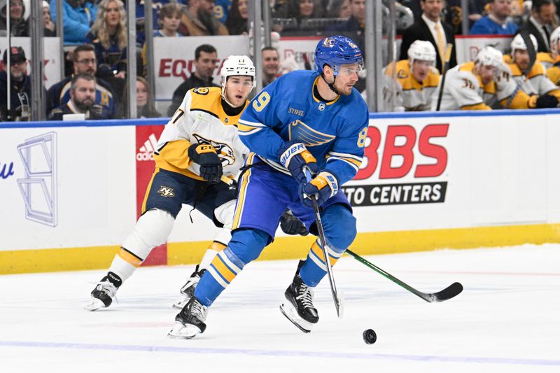 Feb 17, 2024; St. Louis, Missouri, USA; Nashville Predators center Mark Jankowski (17) pressures St. Louis Blues left wing Pavel Buchnevich (89) during the first period at Enterprise Center. Mandatory Credit: Jeff Le-USA TODAY Sports