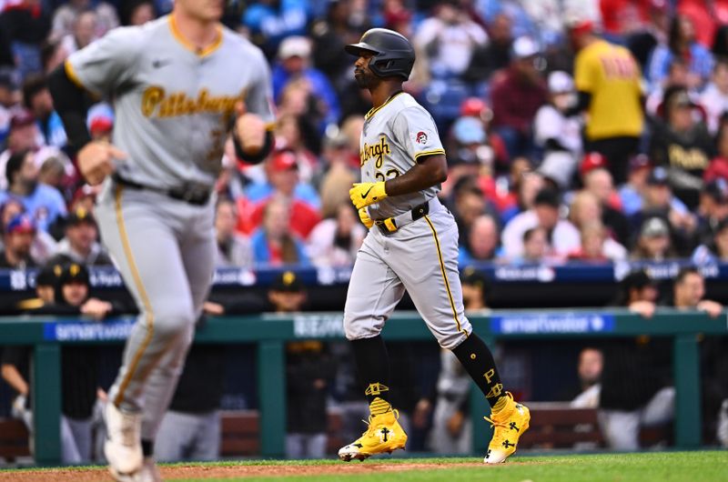 Apr 12, 2024; Philadelphia, Pennsylvania, USA; Pittsburgh Pirates designated hitter Andrew McCutchen (22) advances home to score against the Philadelphia Phillies in the second inning at Citizens Bank Park. Mandatory Credit: Kyle Ross-USA TODAY Sports