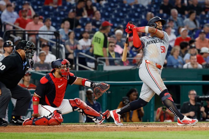 May 21, 2024; Washington, District of Columbia, USA; Minnesota Twins shortstop Willi Castro (50) hits a two run home run against the Washington Nationals during the seventh inning at Nationals Park. Mandatory Credit: Geoff Burke-USA TODAY Sports