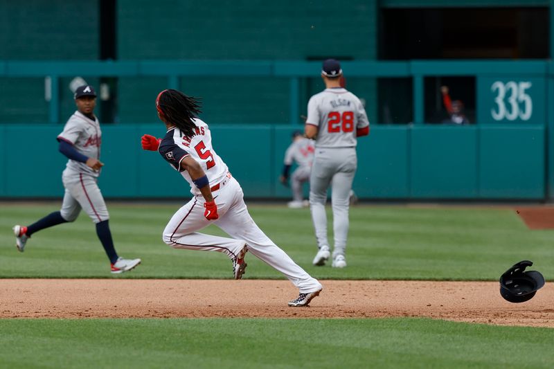 Jun 9, 2024; Washington, District of Columbia, USA; Washington Nationals shortstop CJ Abrams (5) runs to second base after hitting a three run.double against the Atlanta Braves during the fourth inning at Nationals Park. Mandatory Credit: Geoff Burke-USA TODAY Sports