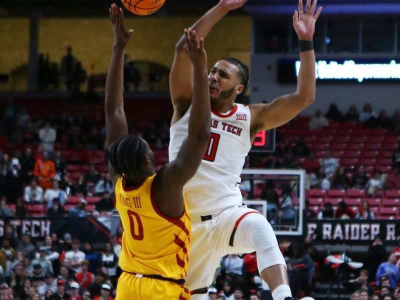 Jan 30, 2023; Lubbock, Texas, USA;  Texas Tech Red Raiders forward Kevin Obanor (0) looses the ball in front of Iowa State Cyclones forward Tre King (0) in the second half at United Supermarkets Arena. Mandatory Credit: Michael C. Johnson-USA TODAY Sports