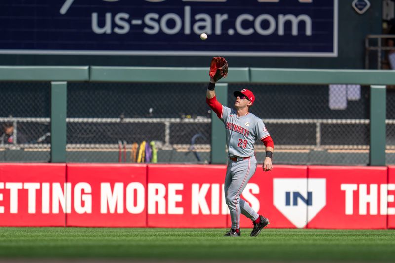 Sep 15, 2024; Minneapolis, Minnesota, USA; Cincinnati Reds center fielder TJ Friedl (29) catches a fly ball against the Minnesota Twins in the eighth inning at Target Field. Mandatory Credit: Jesse Johnson-Imagn Images