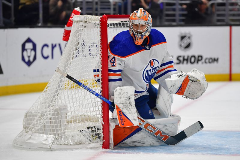 Dec 30, 2023; Los Angeles, California, USA; Edmonton Oilers goaltender Stuart Skinner (74) defends the goal against the Los Angeles Kings during the second period at Crypto.com Arena. Mandatory Credit: Gary A. Vasquez-USA TODAY Sports