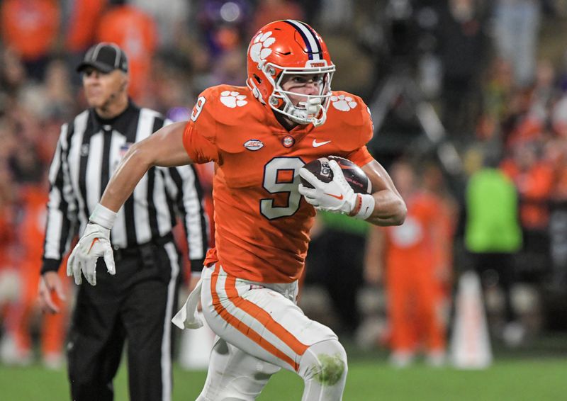 Nov 19, 2022; Clemson, South Carolina, USA; Clemson Tigers tight end Jake Briningstool (9) runs after a catch against the Miami Hurricanes during the fourth quarter at Memorial Stadium. Mandatory Credit: Ken Ruinard-USA TODAY Sports