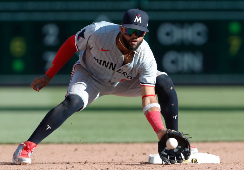 Jun 8, 2024; Pittsburgh, Pennsylvania, USA;  Minnesota Twins second baseman Willi Castro (50) takes a throw at second base for a force out against the Pittsburgh Pirates during the eighth inning at PNC Park. Pittsburgh won 4-0. Mandatory Credit: Charles LeClaire-USA TODAY Sports