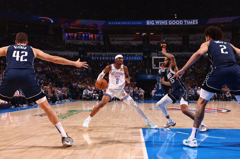 OKLAHOMA CITY, OK - MARCH 14: Shai Gilgeous-Alexander #2 of the Oklahoma City Thunder dribbles the ball during the game against the Dallas Mavericks on March 13, 2024 at Paycom Arena in Oklahoma City, Oklahoma. NOTE TO USER: User expressly acknowledges and agrees that, by downloading and or using this photograph, User is consenting to the terms and conditions of the Getty Images License Agreement. Mandatory Copyright Notice: Copyright 2024 NBAE (Photo by Zach Beeker/NBAE via Getty Images)