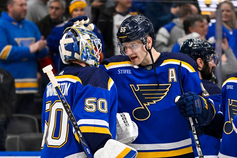 Feb 15, 2024; St. Louis, Missouri, USA;  St. Louis Blues defenseman Colton Parayko (55) and goaltender Jordan Binnington (50) celebrate after the Blues defeated the Edmonton Oilers at Enterprise Center. Mandatory Credit: Jeff Curry-USA TODAY Sports