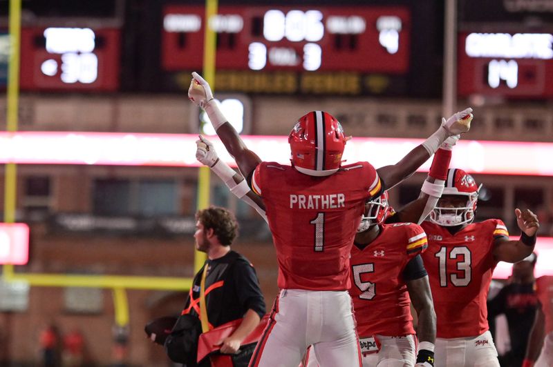 Sep 9, 2023; College Park, Maryland, USA; Maryland Terrapins wide receiver Tai Felton (10) celebrates with teammates after scoring a touchdown during the second half against the Charlotte 49ers at SECU Stadium. Mandatory Credit: Tommy Gilligan-USA TODAY Sports