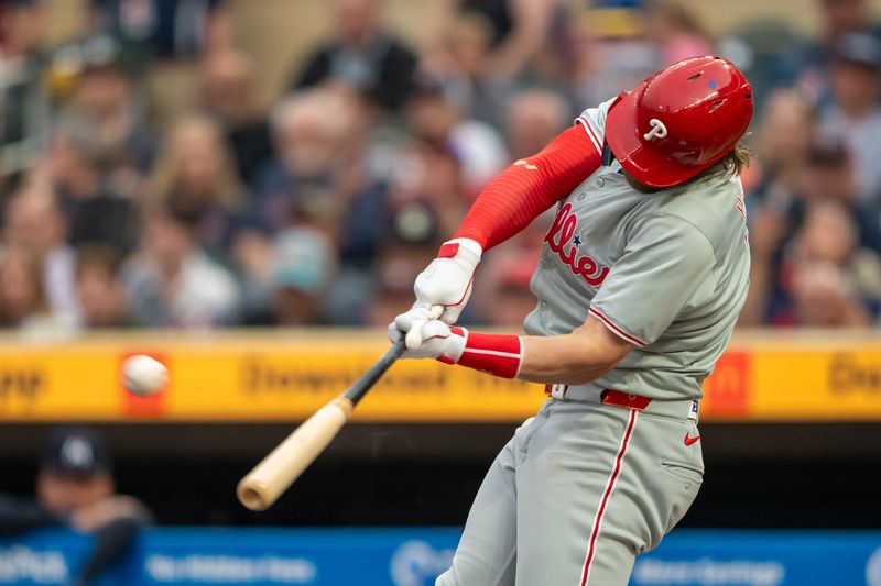 Jul 22, 2024; Minneapolis, Minnesota, USA; Philadelphia Phillies first baseman Bryce Harper (3) hits a two run home run against the Minnesota Twins in the first inning at Target Field. Mandatory Credit: Jesse Johnson-USA TODAY Sports