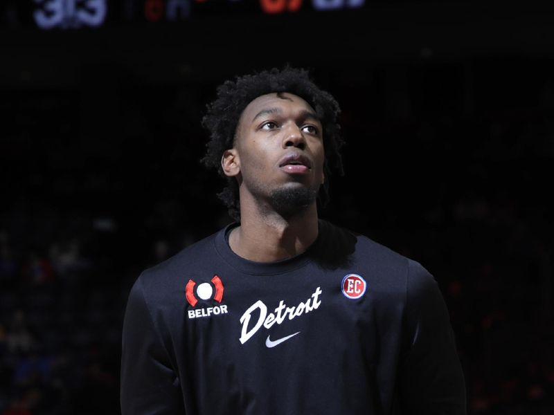 DETROIT, MI - MARCH 20: James Wiseman #13 of the Detroit Pistons warms up before the game against the Indiana Pacers on March 20, 2024 at Little Caesars Arena in Detroit, Michigan. NOTE TO USER: User expressly acknowledges and agrees that, by downloading and/or using this photograph, User is consenting to the terms and conditions of the Getty Images License Agreement. Mandatory Copyright Notice: Copyright 2024 NBAE (Photo by Brian Sevald/NBAE via Getty Images)