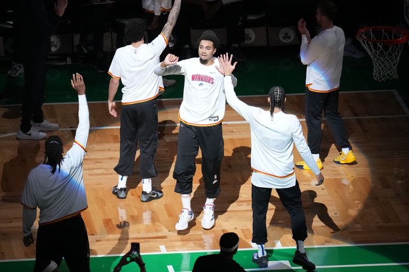 BOSTON, MA - NOVEMBER 6: Trayce Jackson-Davis #32 of the Golden State Warriors is introduced before the game against the Boston Celtics on November 6, 2024 at TD Garden in Boston, Massachusetts. NOTE TO USER: User expressly acknowledges and agrees that, by downloading and/or using this Photograph, user is consenting to the terms and conditions of the Getty Images License Agreement. Mandatory Copyright Notice: Copyright 2024 NBAE (Photo by Jesse D. Garrabrant/NBAE via Getty Images)