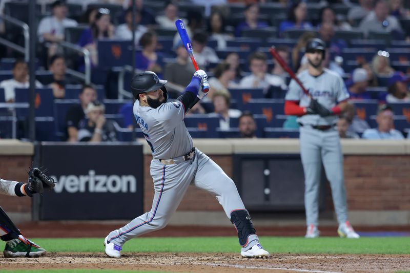 Aug 16, 2024; New York City, New York, USA; Miami Marlins third baseman Emmanuel Rivera (15) follows through on an RBI fielders choice ground ball during the fourth inning against the New York Mets at Citi Field. Mandatory Credit: Brad Penner-USA TODAY Sports