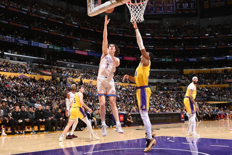 LOS ANGELES, CA - MARCH 4: Josh Giddey #3 of the Oklahoma City Thunder drives to the basket during the game against the Los Angeles Lakers on March 4, 2024 at Crypto.Com Arena in Los Angeles, California. NOTE TO USER: User expressly acknowledges and agrees that, by downloading and/or using this Photograph, user is consenting to the terms and conditions of the Getty Images License Agreement. Mandatory Copyright Notice: Copyright 2024 NBAE (Photo by Andrew D. Bernstein/NBAE via Getty Images)