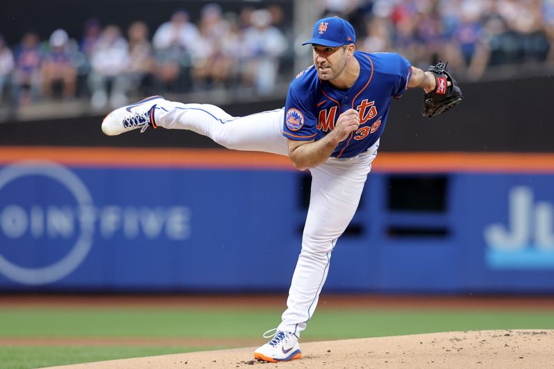 Jun 26, 2023; New York City, New York, USA; New York Mets starting pitcher Justin Verlander (35) follows through on a pitch against the Milwaukee Brewers during the first inning at Citi Field. Mandatory Credit: Brad Penner-USA TODAY Sports