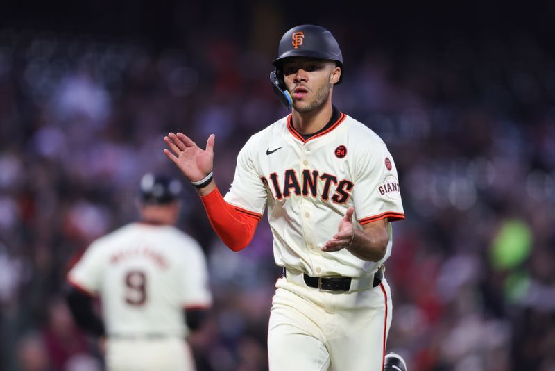 Aug 19, 2024; San Francisco, California, USA; San Francisco Giants outfielder Grant McCray (58) scores a run during the fifth inning against the Chicago White Sox at Oracle Park. Mandatory Credit: Sergio Estrada-USA TODAY Sports