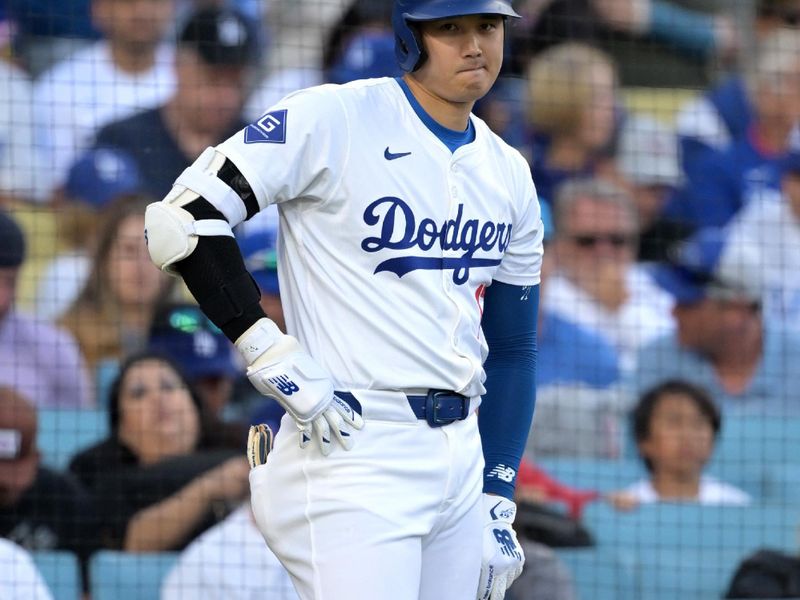 May 18, 2024; Los Angeles, California, USA;  Los Angeles Dodgers designated hitter Shohei Ohtani (17) waits on deck in the third inning against the Cincinnati Reds at Dodger Stadium. Mandatory Credit: Jayne Kamin-Oncea-USA TODAY Sports