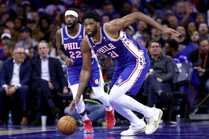 PHILADELPHIA, PENNSYLVANIA - DECEMBER 11: Joel Embiid #21 of the Philadelphia 76ers dribbles during the third quarter against the Washington Wizards at the Wells Fargo Center on December 11, 2023 in Philadelphia, Pennsylvania. (Photo by Tim Nwachukwu/Getty Images)