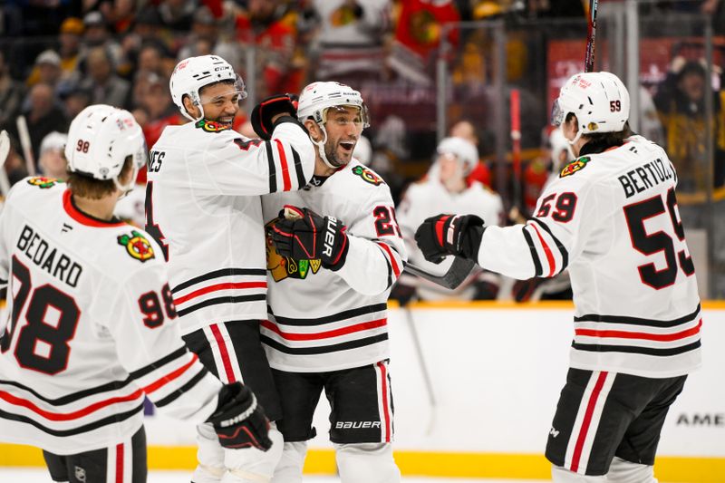 Jan 16, 2025; Nashville, Tennessee, USA;  Chicago Blackhawks defenseman Alec Martinez (25) celebrates his goal with his teammates  against the Nashville Predators during the second period at Bridgestone Arena. Mandatory Credit: Steve Roberts-Imagn Images