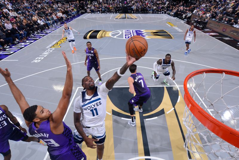 SACRAMENTO, CA - NOVEMBER 15: Naz Reid #11 of the Minnesota Timberwolves drives to the basket during the game against the Sacramento Kings during the Emirates NBA Cup game on November 15, 2024 at Golden 1 Center in Sacramento, California. NOTE TO USER: User expressly acknowledges and agrees that, by downloading and or using this Photograph, user is consenting to the terms and conditions of the Getty Images License Agreement. Mandatory Copyright Notice: Copyright 2024 NBAE (Photo by Rocky Widner/NBAE via Getty Images)