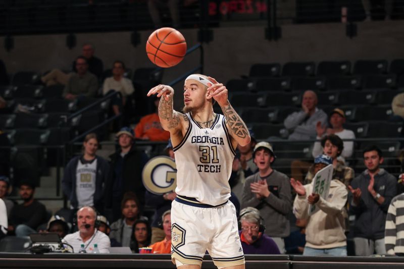 Jan 14, 2025; Atlanta, Georgia, USA; Georgia Tech Yellow Jackets forward Duncan Powell (31) makes a pass against the Clemson Tigers during the second half at McCamish Pavilion. Mandatory Credit: Jordan Godfree-Imagn Images