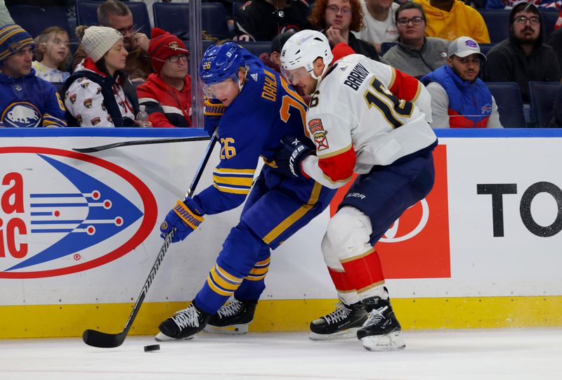 Feb 15, 2024; Buffalo, New York, USA;  Buffalo Sabres defenseman Rasmus Dahlin (26) controls the puck as Florida Panthers center Aleksander Barkov (16) defends during the third period at KeyBank Center. Mandatory Credit: Timothy T. Ludwig-USA TODAY Sports